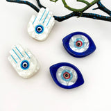 Mini Blue Sun Eye Acrylic Hair Claw Clip: Hand