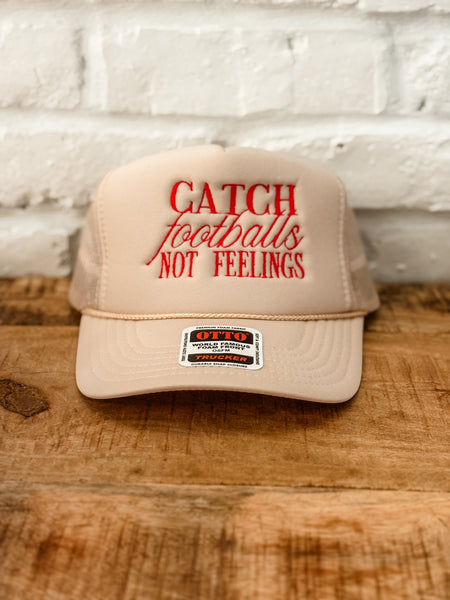 CATCH FOOTBALLS TRUCKER HAT