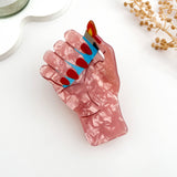 🚬 Smoking Hand Hair Claw – Bold PVC Graphic Clip 😎
: A