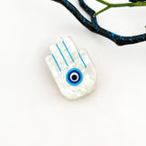 Mini Blue Sun Eye Acrylic Hair Claw Clip: Hand