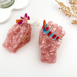 🚬 Smoking Hand Hair Claw – Bold PVC Graphic Clip 😎
: A