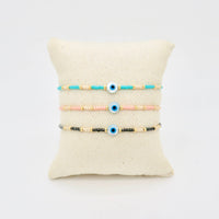 Evil Eye Dainty Miyuki Bracelet: Light pink