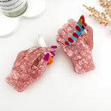 🚬 Smoking Hand Hair Claw – Bold PVC Graphic Clip 😎
: A